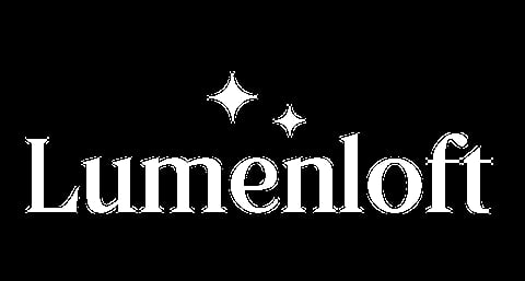 Lumenloft logo with white text and decorative sparkle symbols on black background